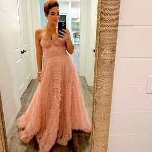 The Viana Dress by Alexis is the perfect gown if you want to make an impression.